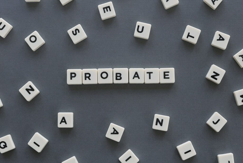 close up of letter tiles that spell out the word "probate"