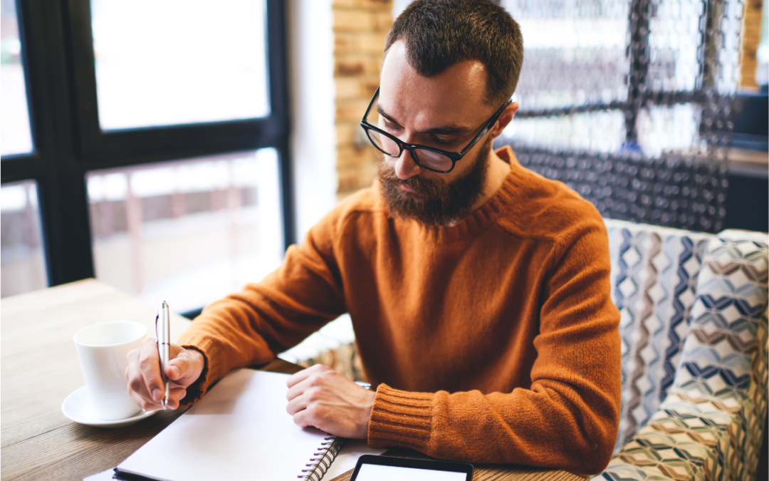 man concentrating on some documents as he is a fiduciary in tennessee