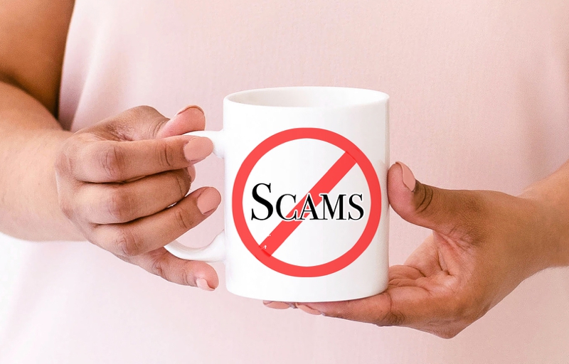 Stop scams with these steps. image of a coffee mug with with word scam crossed out.