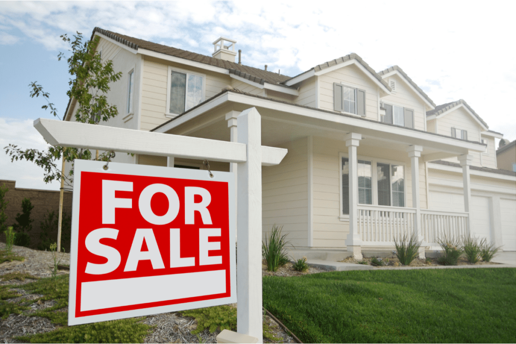 a house with a for sale sign in front of it. Tennessee will go through tenncare estate recovery to be reimbursed for long-term care. 