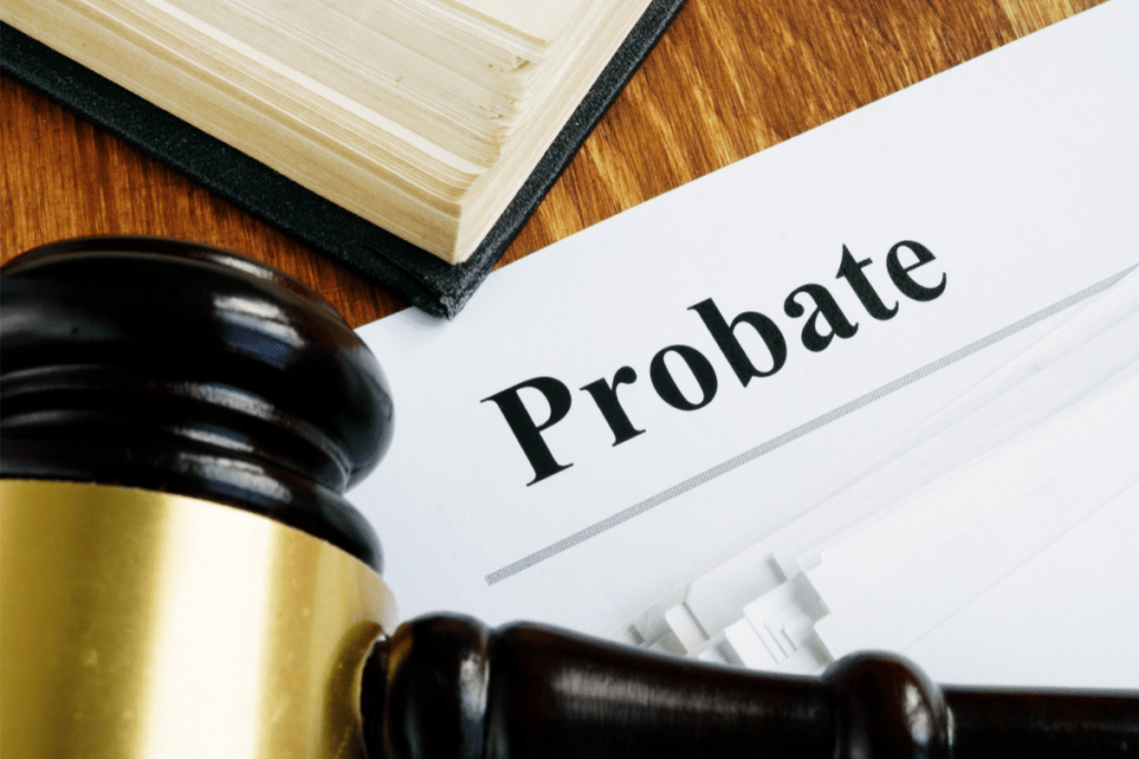 probate court setting with paper, law book, and gavel. Not all assets pass through probate.