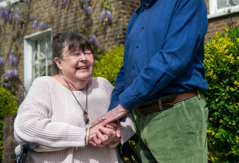 Caregiving is a joy to this older man, who is caring for his wife.